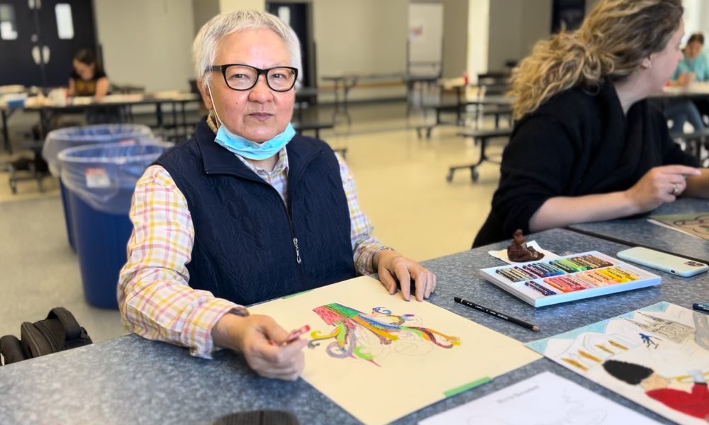 A participant drawing a story